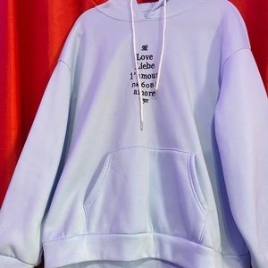“Love” sweater.